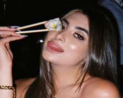 Nicolette Gray eating non vegetarian food
